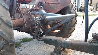 Vintage Thursday. Ferguson tractor pick up hitch installation.