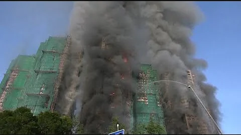 Death toll rises to 128 in Hong Kong residential fire as 8 more arrested over towers' renovation