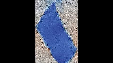 Uniaxial compression of dense packing of bulk material — displacement magnitude