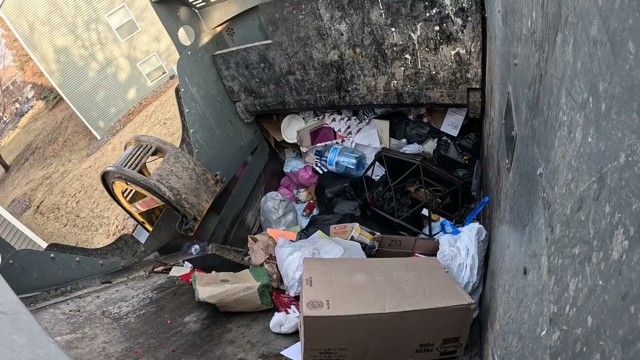 Garbage truck hopper POV: Heavy Friday trash