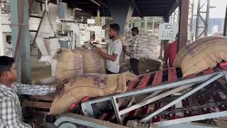FCI Rice packing with automatic stitching and direct truck loading conveyor