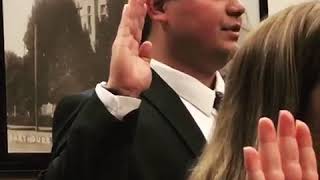 Western state college of law alumni being sworn in as attorneys and
counselors at law.