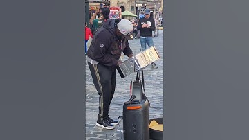 Base And Drum African Street Preformer At The Edinburgh Fringe Festival