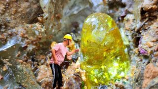 After the volcanic eruption, golden ball crystals grow on the stone. diamond digger