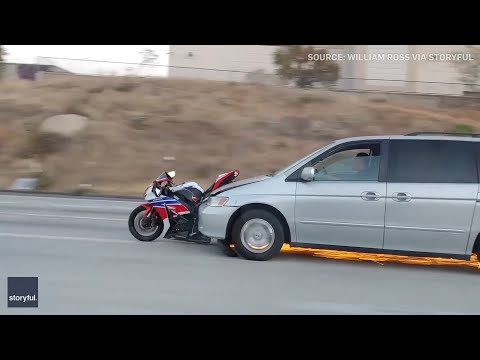 Caught on cam: Minivan drags motorcycle on Calif. freeway