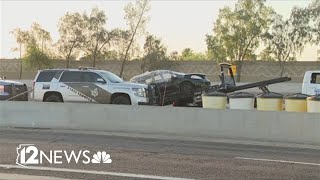 Woman in custody after body found in burned car
