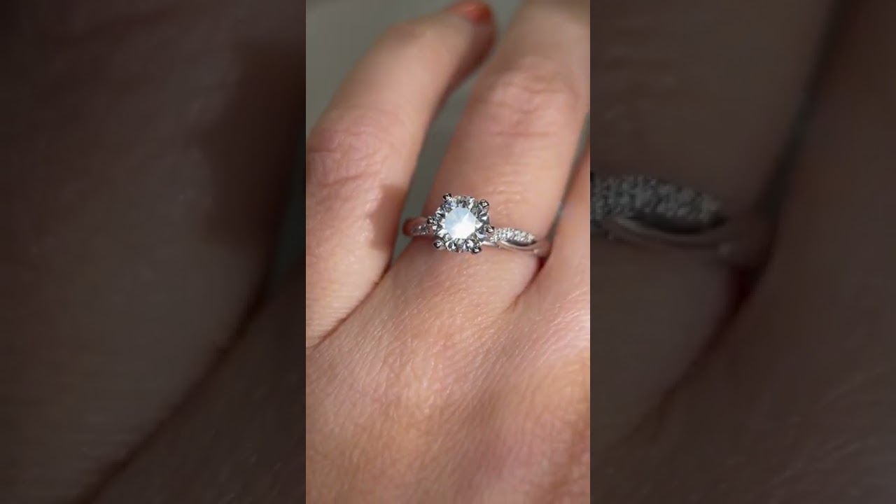 C1021 Handmade White Gold 6 Claw Diamond Engagement Ring with Twist Diamonds set into the band.