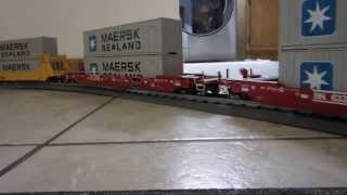 BNSF Maersk O-Scale intermodal train on carpet