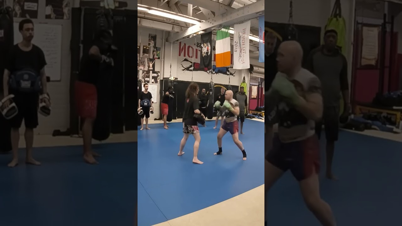 Power combo with shoulder roll for Muay Thai