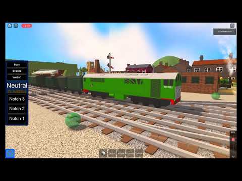 BTWF BoCo Pulling Green Vans Through Crosby Station