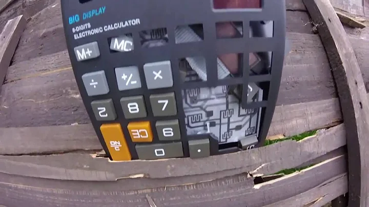 Catapult smashing a calculator