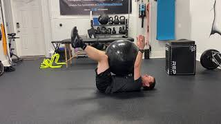 Deadbug isometric hold with physioball