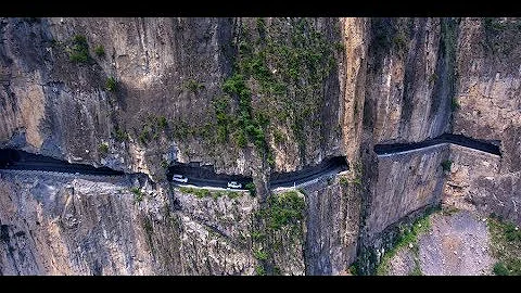 Villagers carve out cliff road in 15 years - DayDayNews