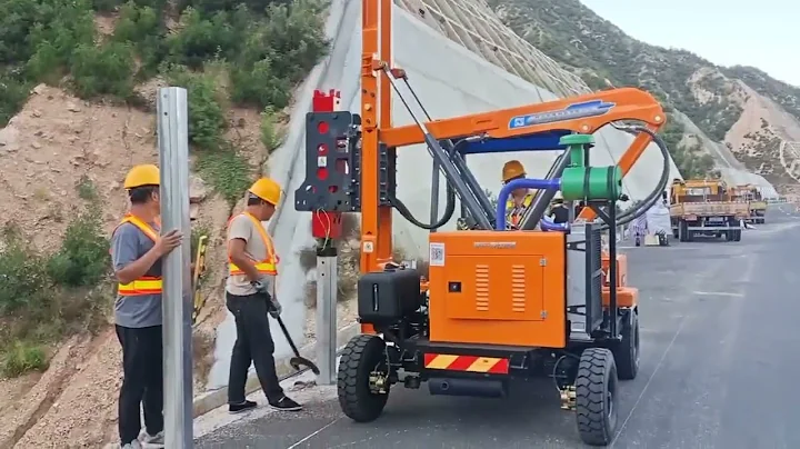 The Guardrail Post Driver Installing Safety Barrier