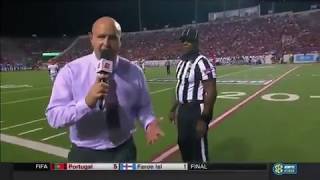 Reporter Gets Mean Look After Bumping into Ref