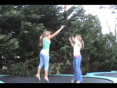 Scarlett and Morgan jumping on Trampoline