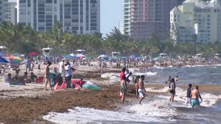 Tourists hit beach for Memorial Day despite rough surf