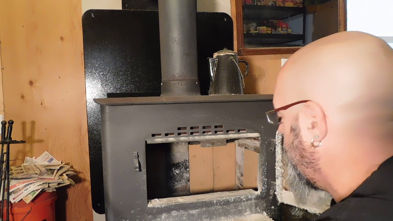 Changing out the fire brick in my country hearth wood stove. 