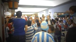 Singing Argentine football fans take over a Brazilian food court in Porto Alegre- World Cup 2014