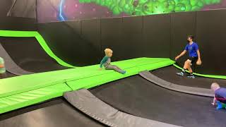 Azi in the middle of a dodgeball game at Defy, trying to figure out how to get in on the action
