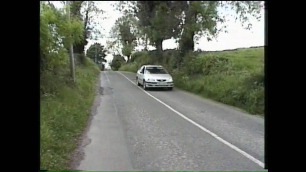 Car rolling up hill in Louth.wmv