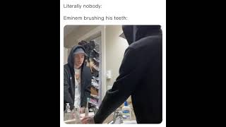 Eminem brushes his teeth