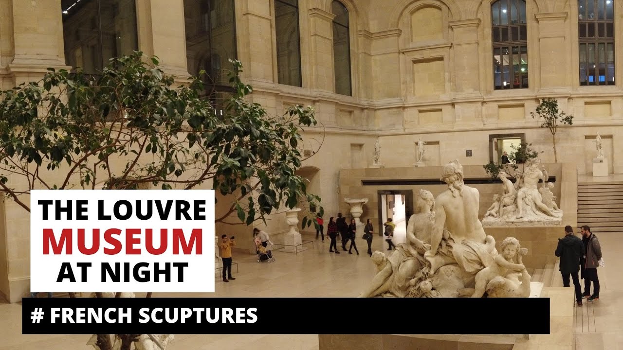 Inside Louvre museum at night. Denon wing. French scupturas. 4K video guide.