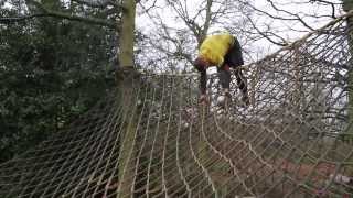 How to climb and flip over an A-frame cargo net