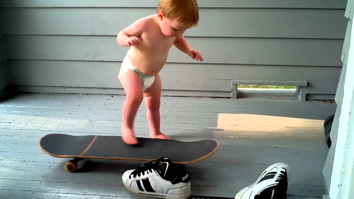 Babys first time on skateboard...