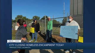 Residents, volunteers protest closing of Kalamazoo homeless encampment