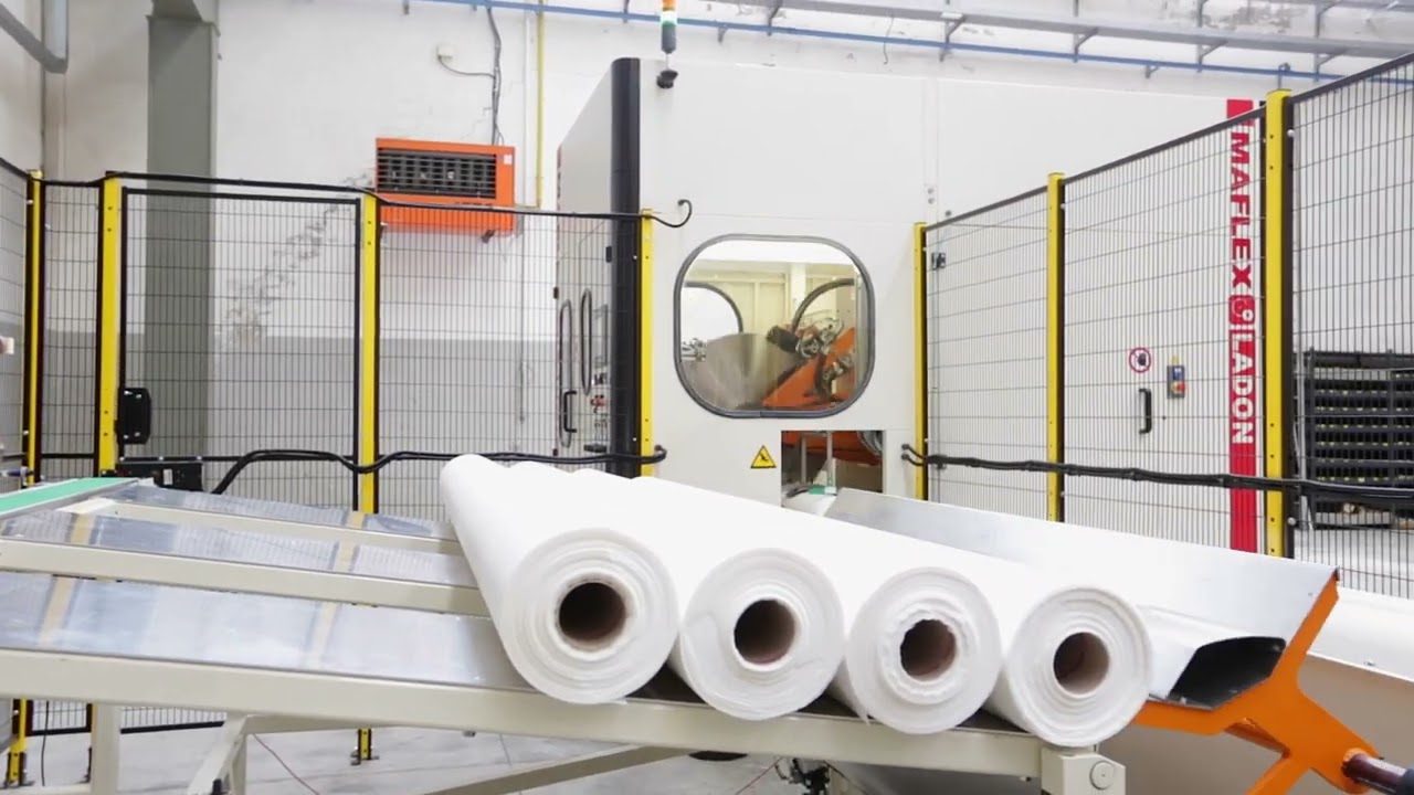 MAFLEX HERA with HELIO embosser, accumulator model LA 20 and LADON Log Saw.