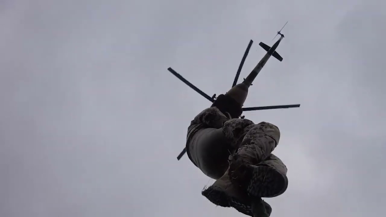 WAR IN UKRAINE: Ukrainian Troops Train To Evacuate The Wounded With Rope Under Mi-8 Helicopter
