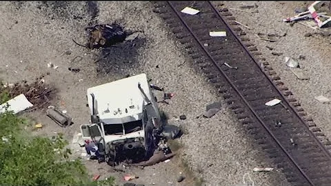 Train bursts into flames after crash with semi-truck in Union City; 4 injured