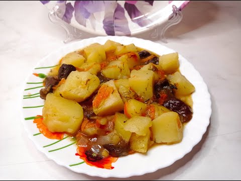 Video: Gestoofde Aardappelen Met Champignons Koken
