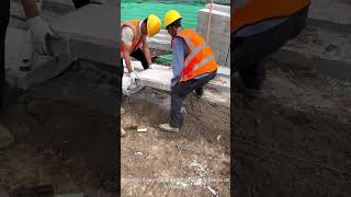 Process of Laying Large Stone Paving Blocks on a Walkway
