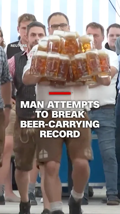 Man attempts to break beer-carrying record Man attempts to break beer-carrying record