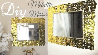 This is a diy wall mirror decor that has metallic look using items
found in the home. quick and inexpensive way to have gold deco...