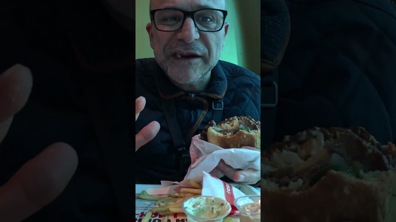 Sweden, Eating Cheeseburger at the MAX Swedish Fast food  restaurant for the first time short