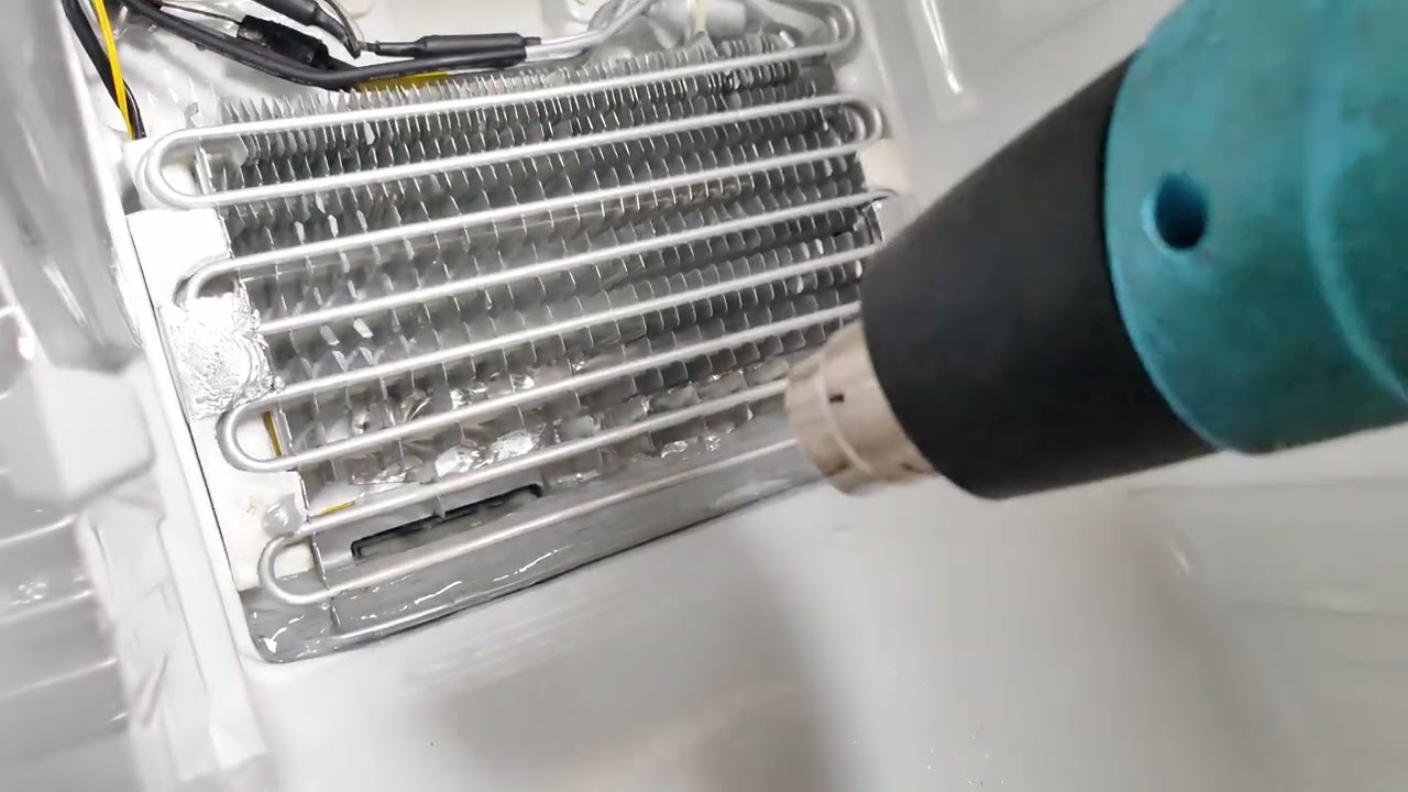 Samsung RL38ECSW - Fridge won't cool, freezer full of ice blocking port