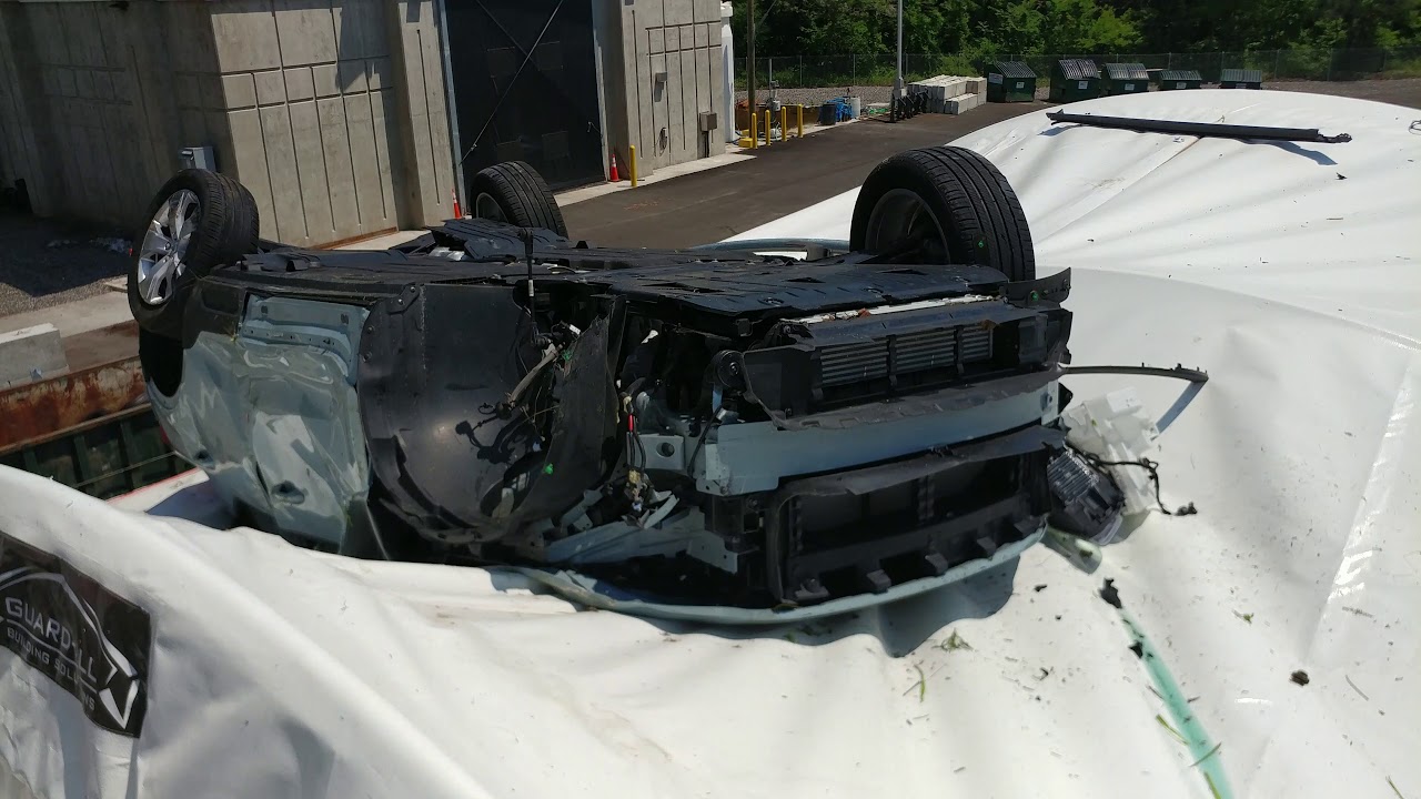 VOLVO FLIPS OFF GARDEN STATE PARKWAY NORTH FRONT WHEEL COMES OFF 3
