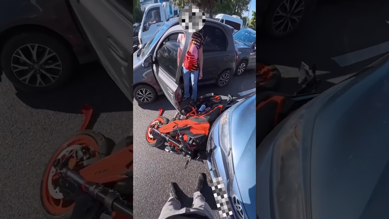 Driver Opens Door on Biker While Lane Splitting @suwirides on ig