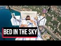 Bed in the sky: Man promotes paragliding in Turkey with unique stunt