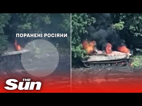Russian soldiers flee from BURNING TANK after it it stuck by Ukrainian Artillery.