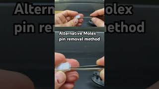 Removing a Molex pin with tweezers #molex #diy