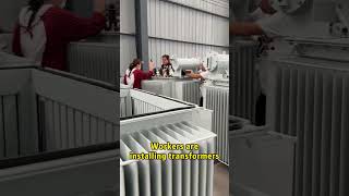 Workers are installing transformers # Transformers # Power Equipment # Power Industry