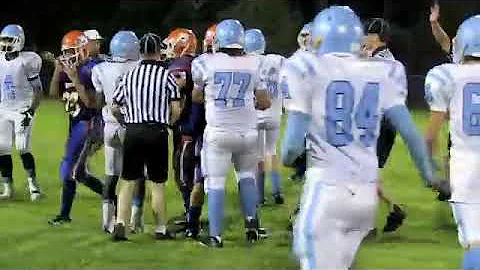 Julian McDaniel shows sportsmanship after hit