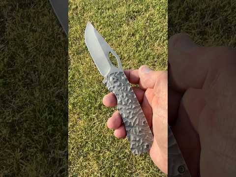 My McNees rock textured Ti scaled hollow ground Magnacut Dixon knife is a joy