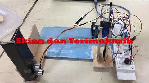 Portal Otomatis dan Alarm Kebakaran Menggunakan Arduino Uno