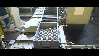 Fanuc robot packaging cell.