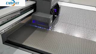 CAIYI UV Flatbed printer is printing on the PVC leather
